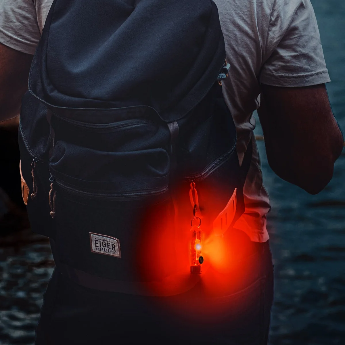 RovyVon Aurora A8 side light clipped to a backpack outdoors