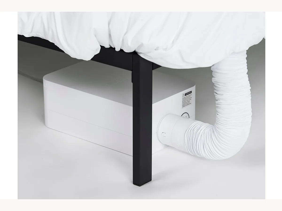 BedJet 3 unit installed under the side of a bed