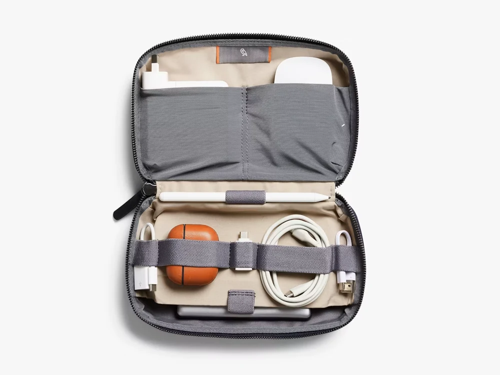 Bellroy Tech Kit open with organized cables and accessories