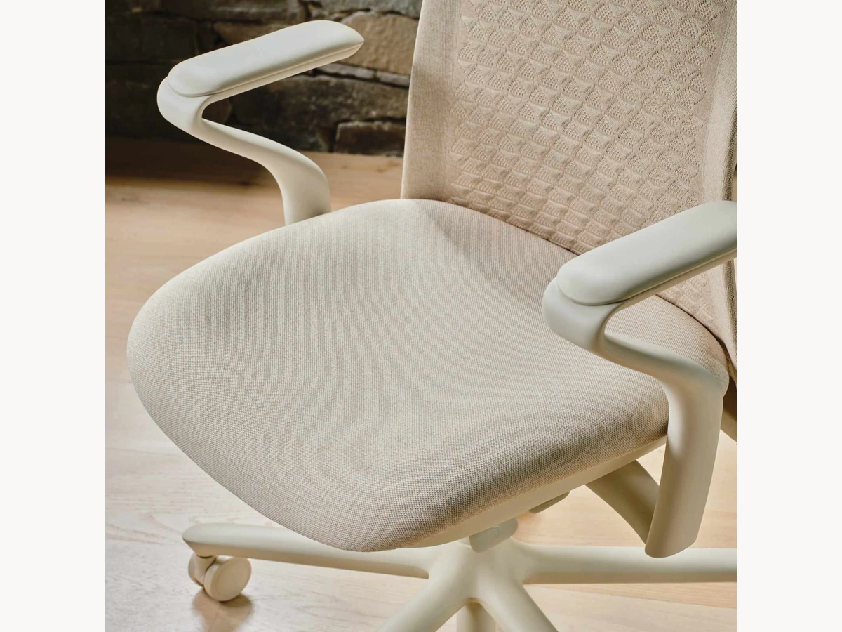 Branch Verve Chair seat and arms in a light interior detail shot