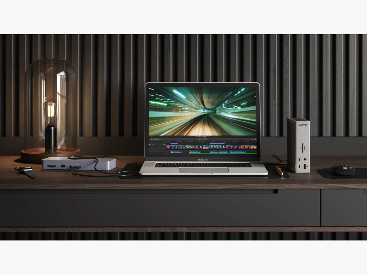 CalDigit Thunderbolt Station 4 on a desk with a laptop and monitor