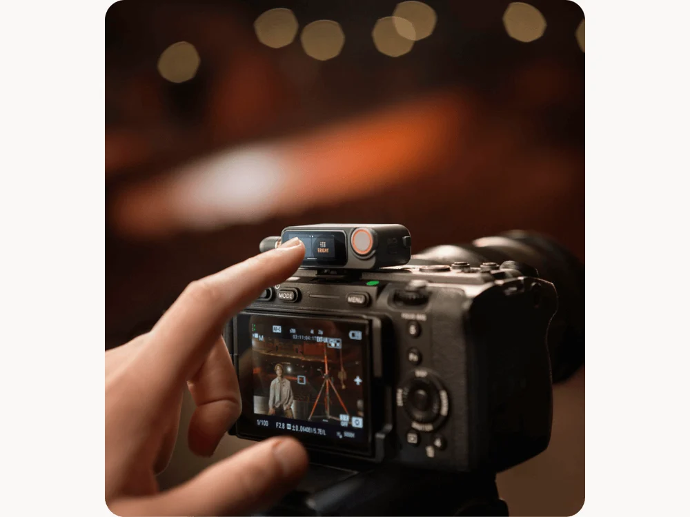 DJI Mic 3 receiver mounted on a camera