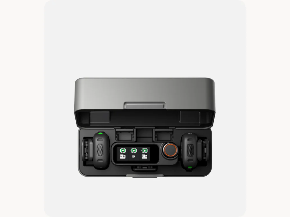DJI Mic 3 charging case open with transmitters and receiver