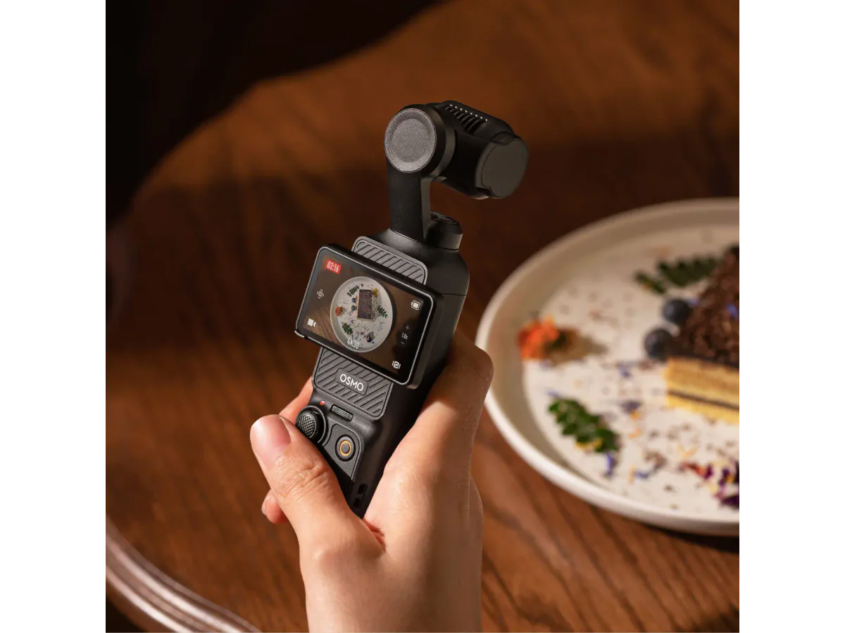 DJI Osmo Pocket 3 being used at a table