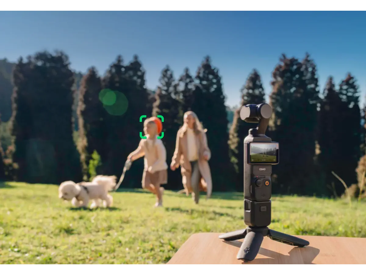 DJI Osmo Pocket 3 filming outdoors on a small tripod