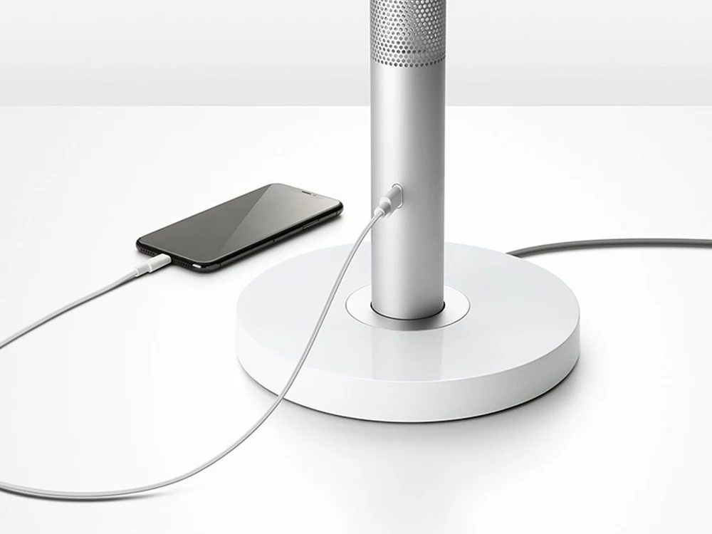 Dyson Solarcycle Morph Desk Light charging a phone