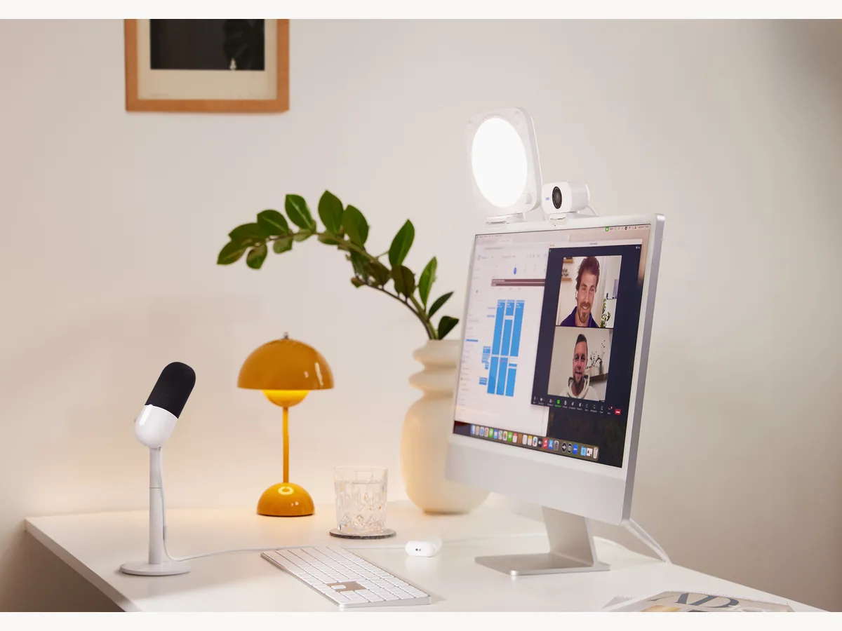 Elgato Key Light Neo mounted behind a monitor in a clean desk setup
