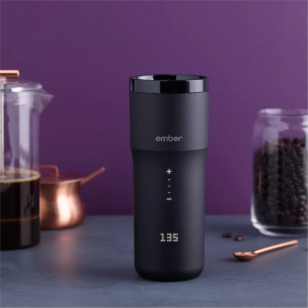 Ember Travel Mug 2 with coffee gear on a purple background