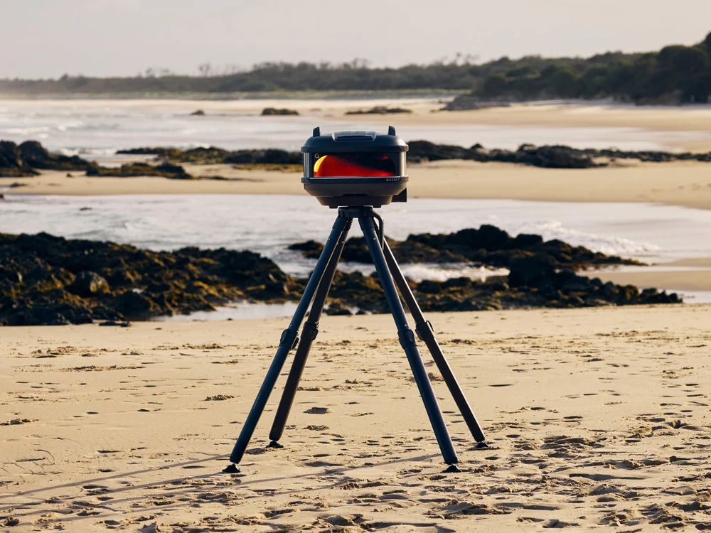 Gozney Tread Portable Pizza Oven on a stand at the beach