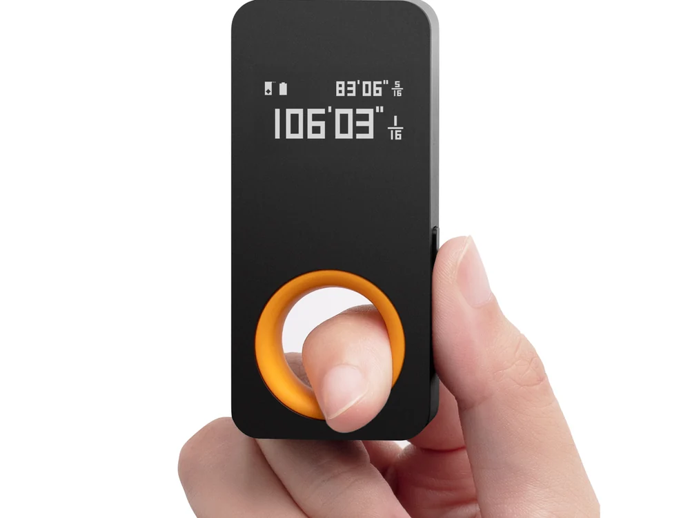 HOTO Laser Measuring Tool in hand with OLED measurement display