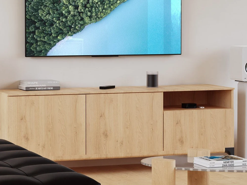 White Kanto REN speakers in a living room TV setup