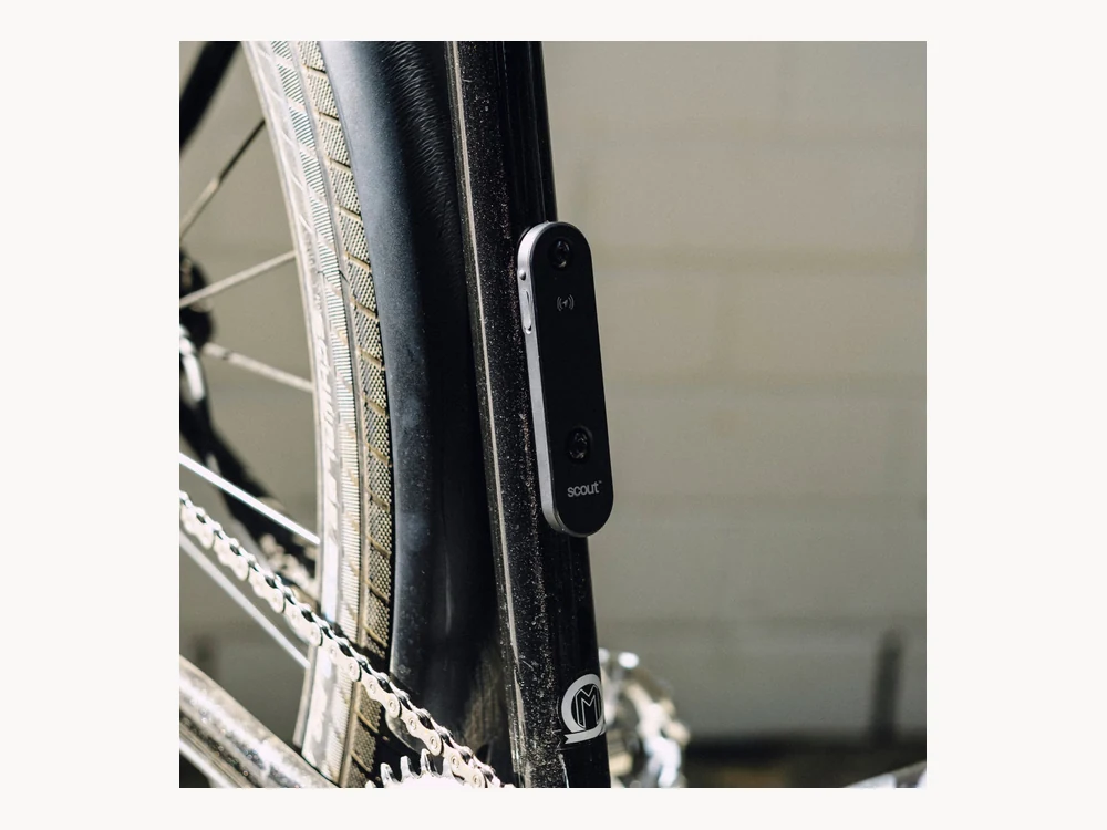 Knog Scout mounted discreetly near a bike wheel