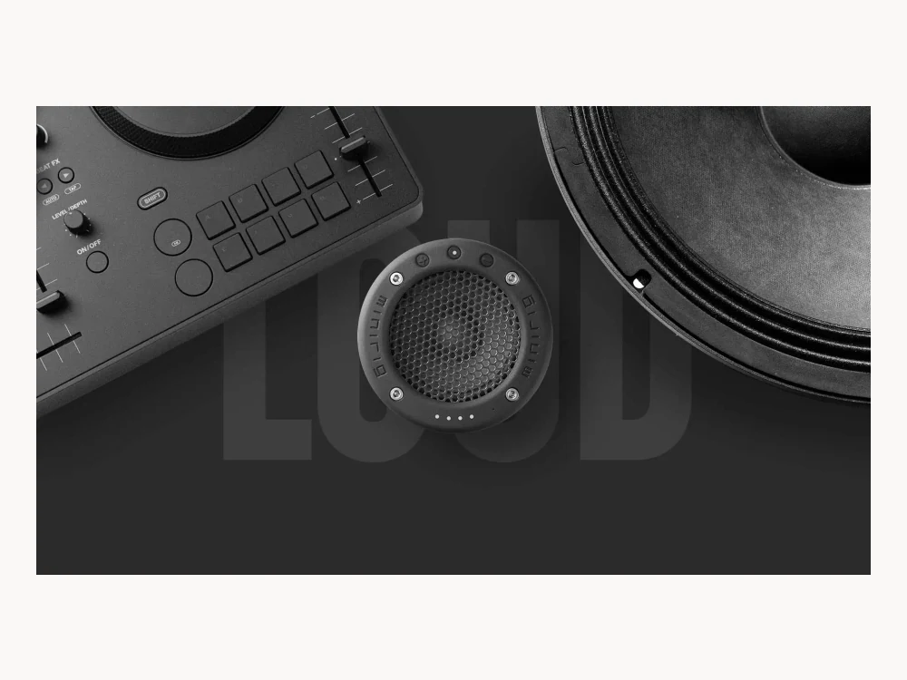 Minirig 4 shown near DJ audio gear