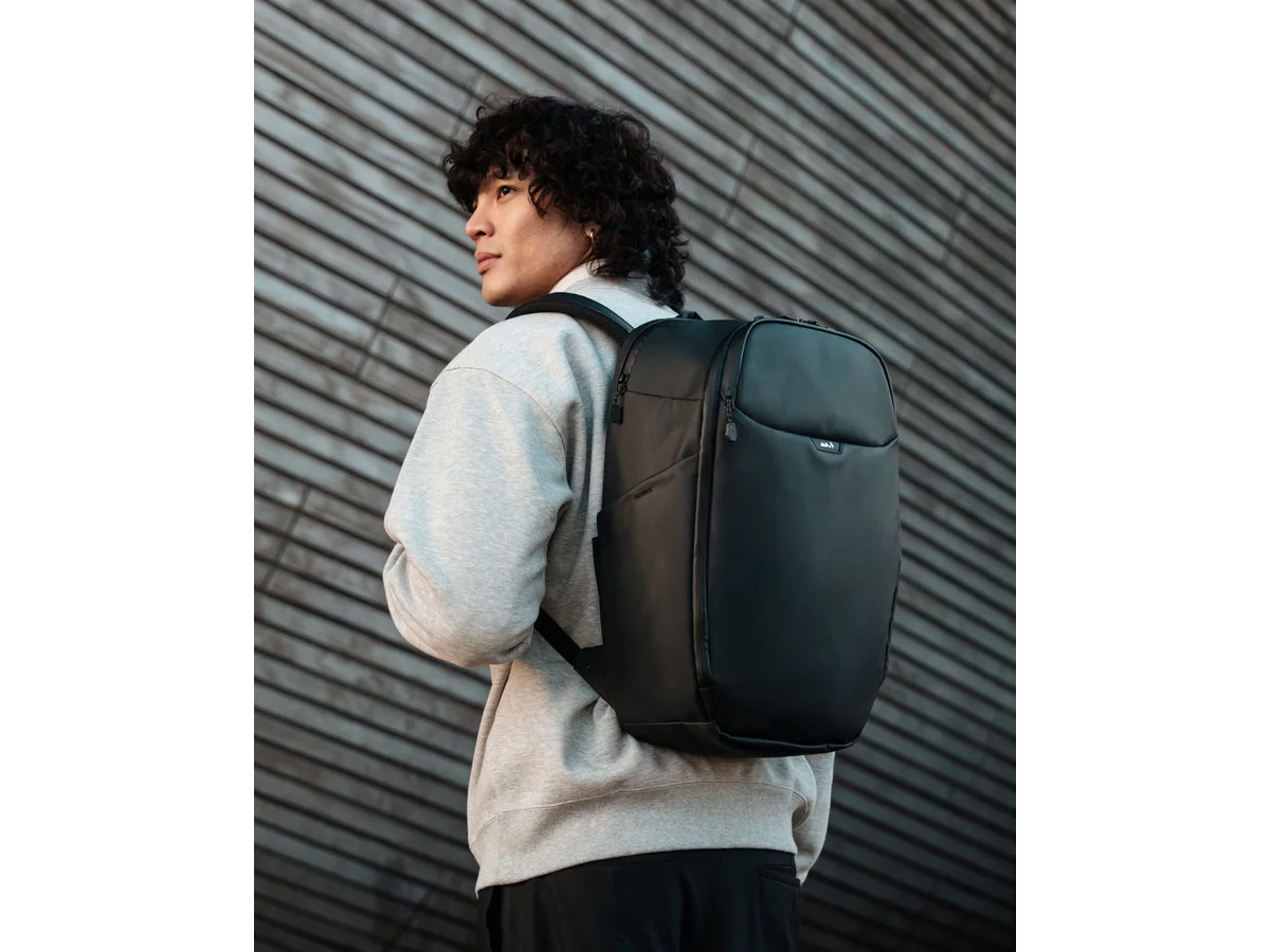 Mous Protective Zip Backpack Day worn by a commuter