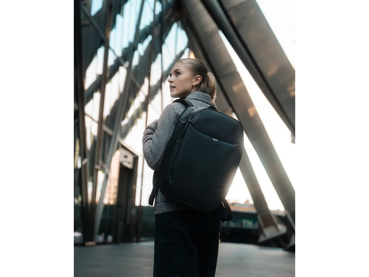 Mous Protective Zip Backpack Day in use on city stairs
