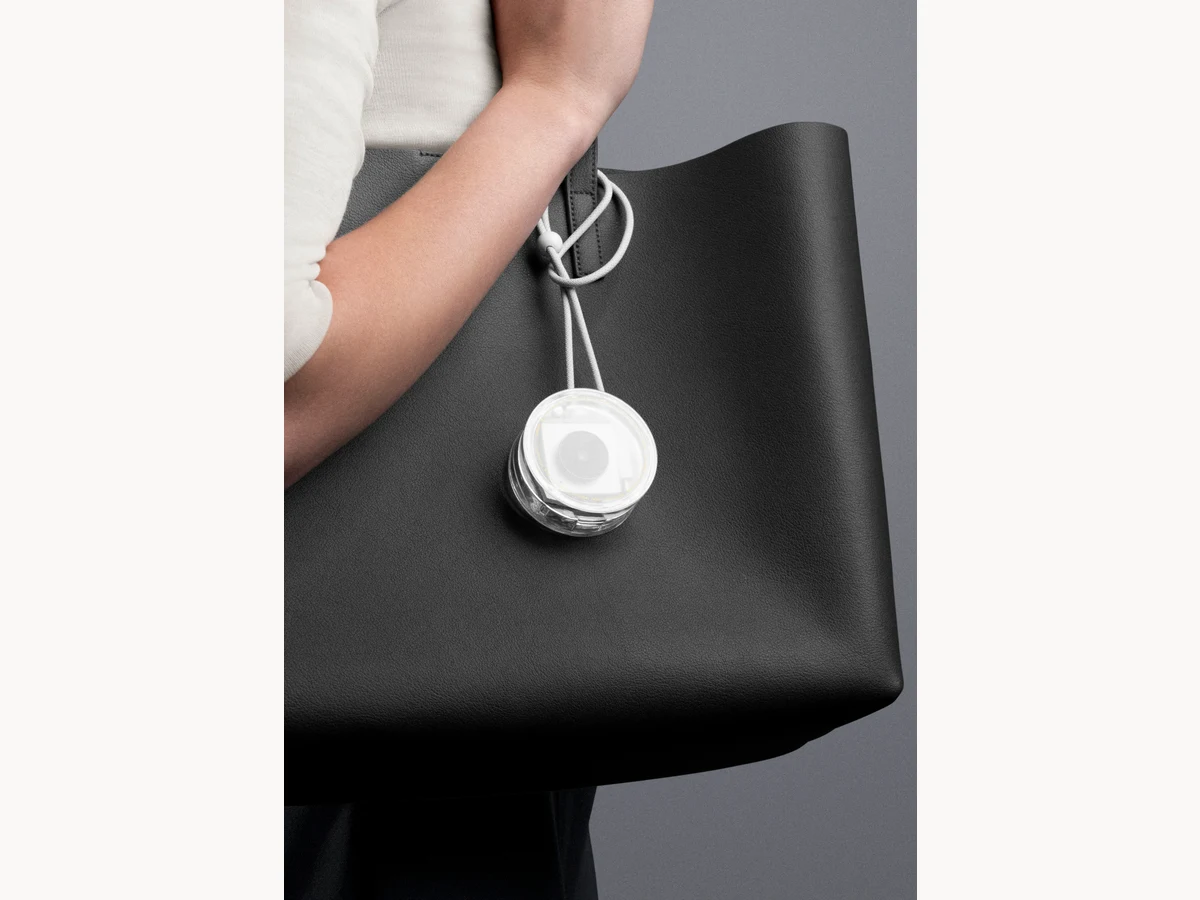Opal Tadpole and case on a bag