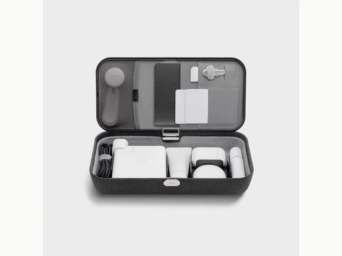 Orbitkey Nest v2 open with internal dividers and tech accessories