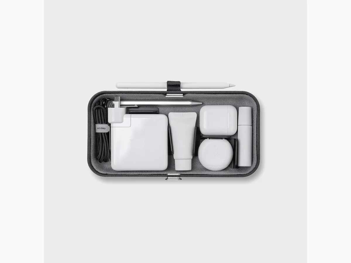 Orbitkey Nest v2 with phone on the wireless charging lid