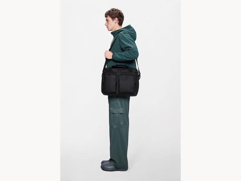 Rains Texel Tech Bag worn by a man outdoors
