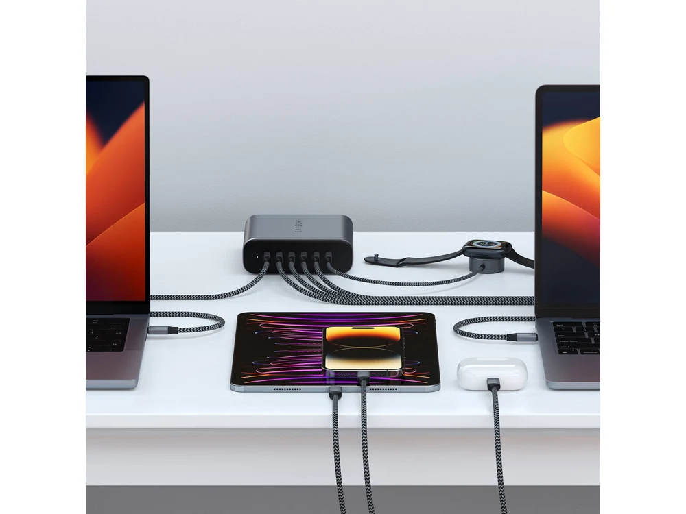Satechi 200W charger on a dual-laptop desk setup