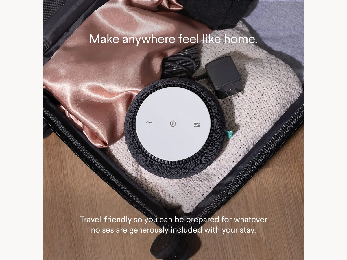 SNOOZ white noise machine packed for travel