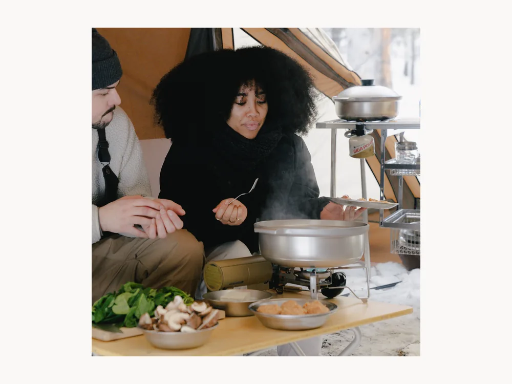 Snow Peak Home & Camp Burner set up with cookware