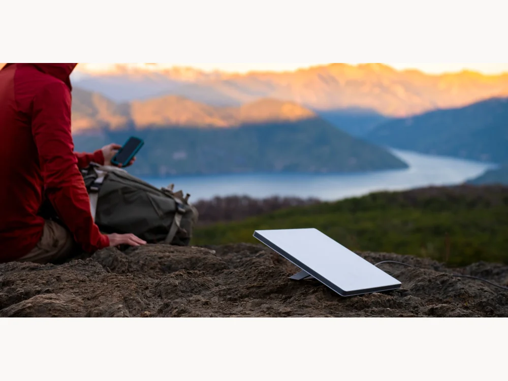 Starlink Mini set up outdoors in mountain terrain