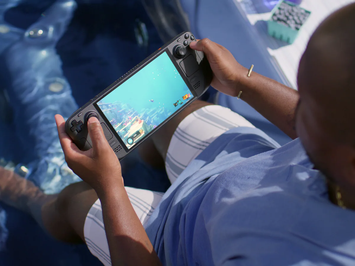 Steam Deck OLED being played handheld with a game on screen