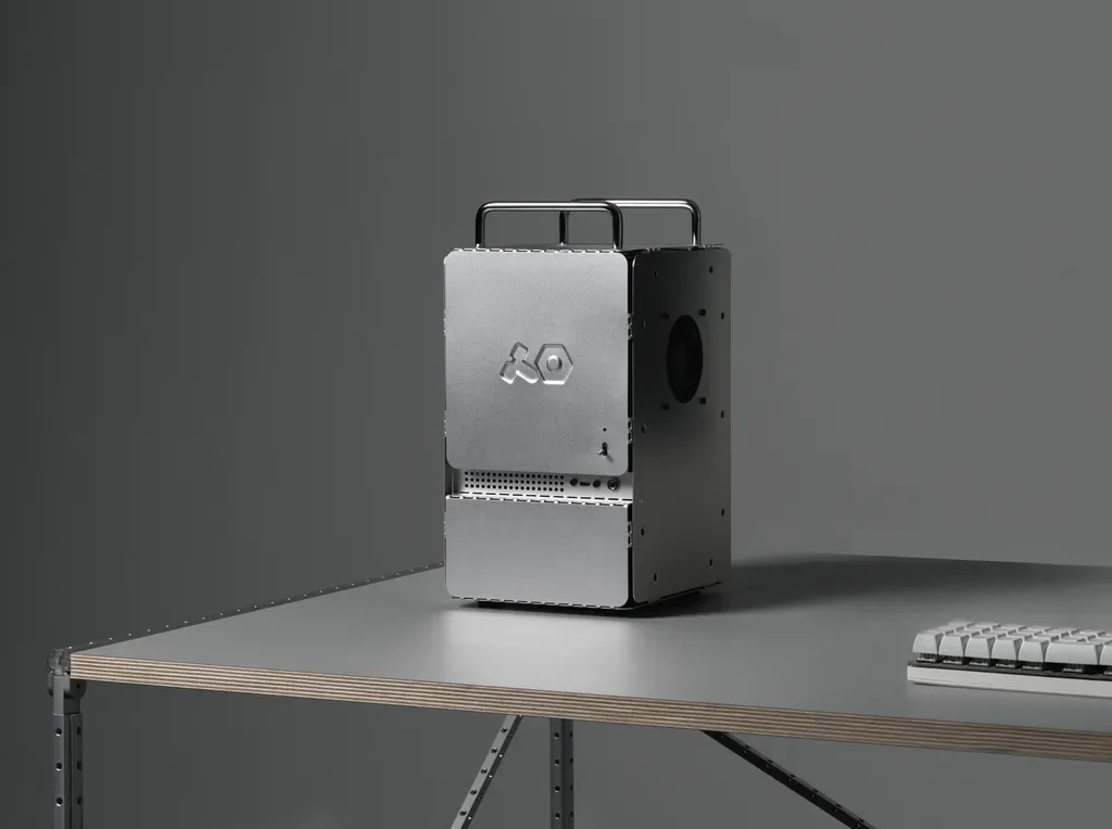 teenage engineering computer–1 case on a desk beside a keyboard