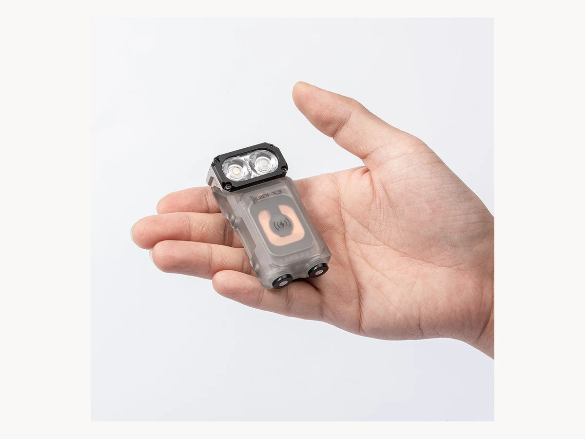 Wuben X3 flashlight held in a hand for scale